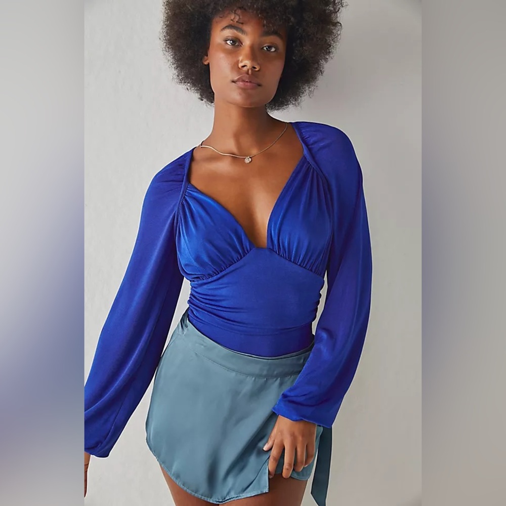 NWT! Free People ‘in your arms’ bodysuit. XS. Electric indigo. $68